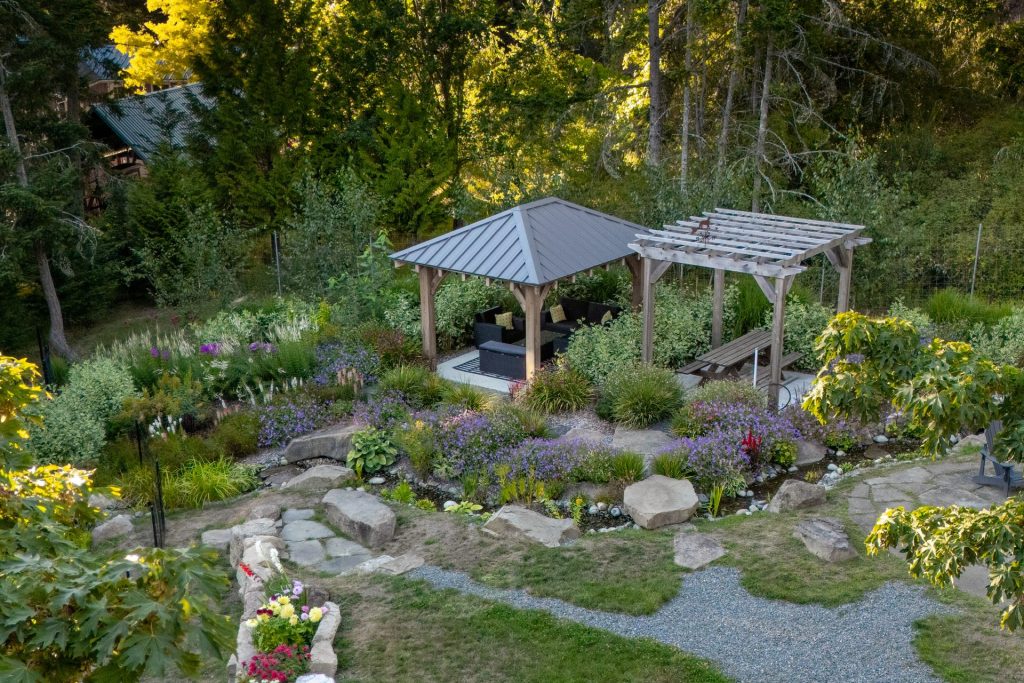 Aerial view of a gazebo, pergola and dry creek bed garden